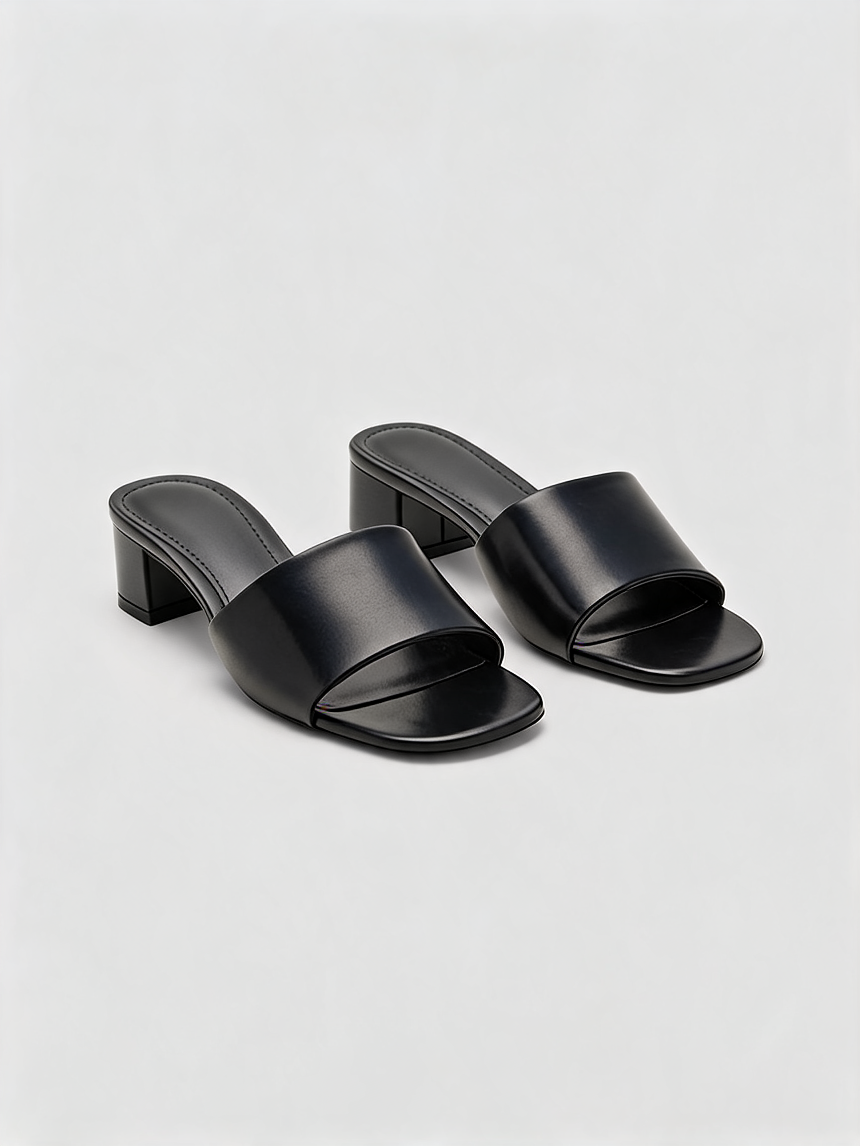 Black leather block heel mules with square open toe — Belvarnè Noir pair