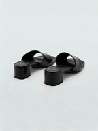 Black leather block heel mules with square open toe — Belvarnè Noir pair