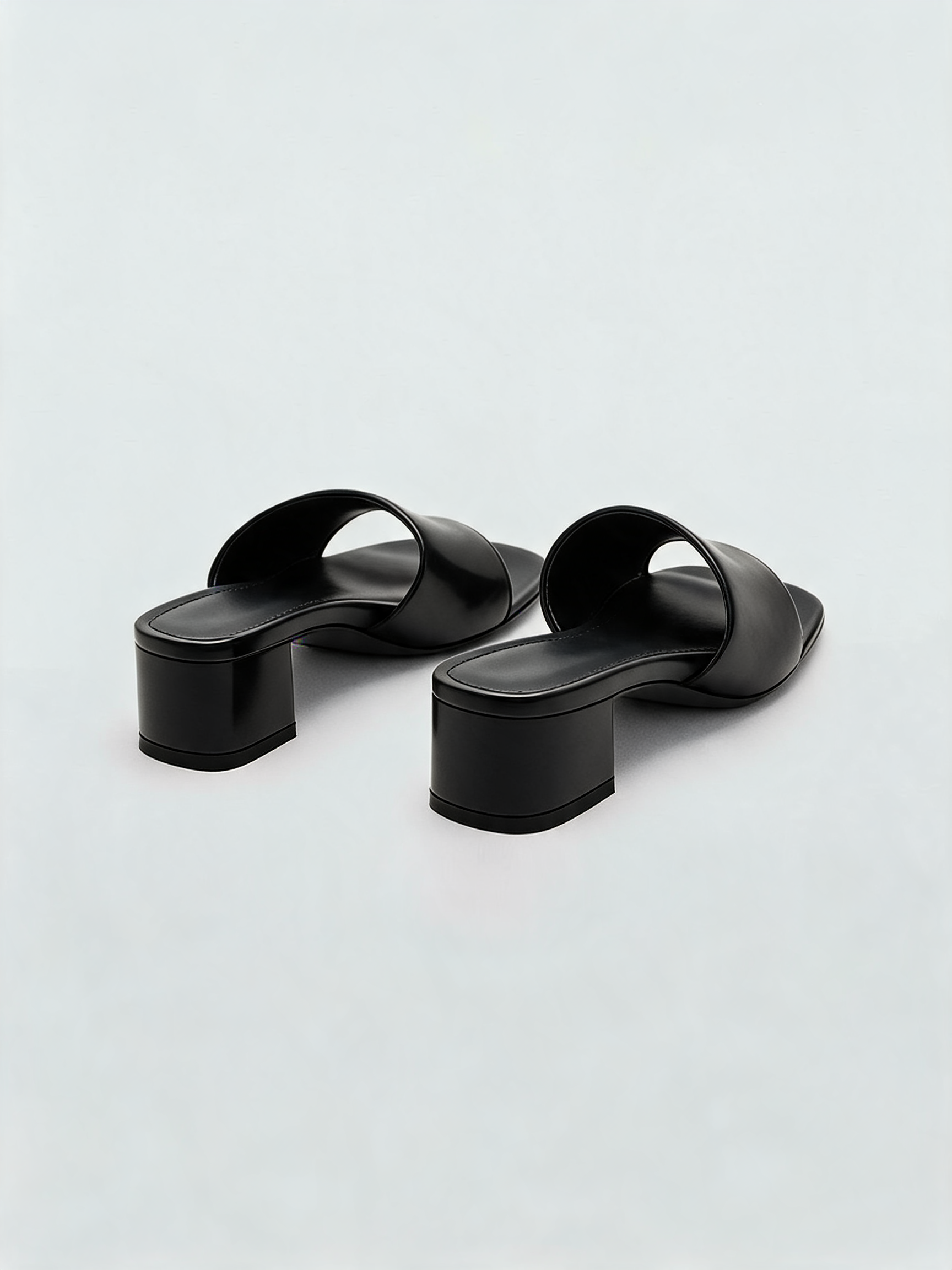 Black leather block heel mules with square open toe — Belvarnè Noir pair