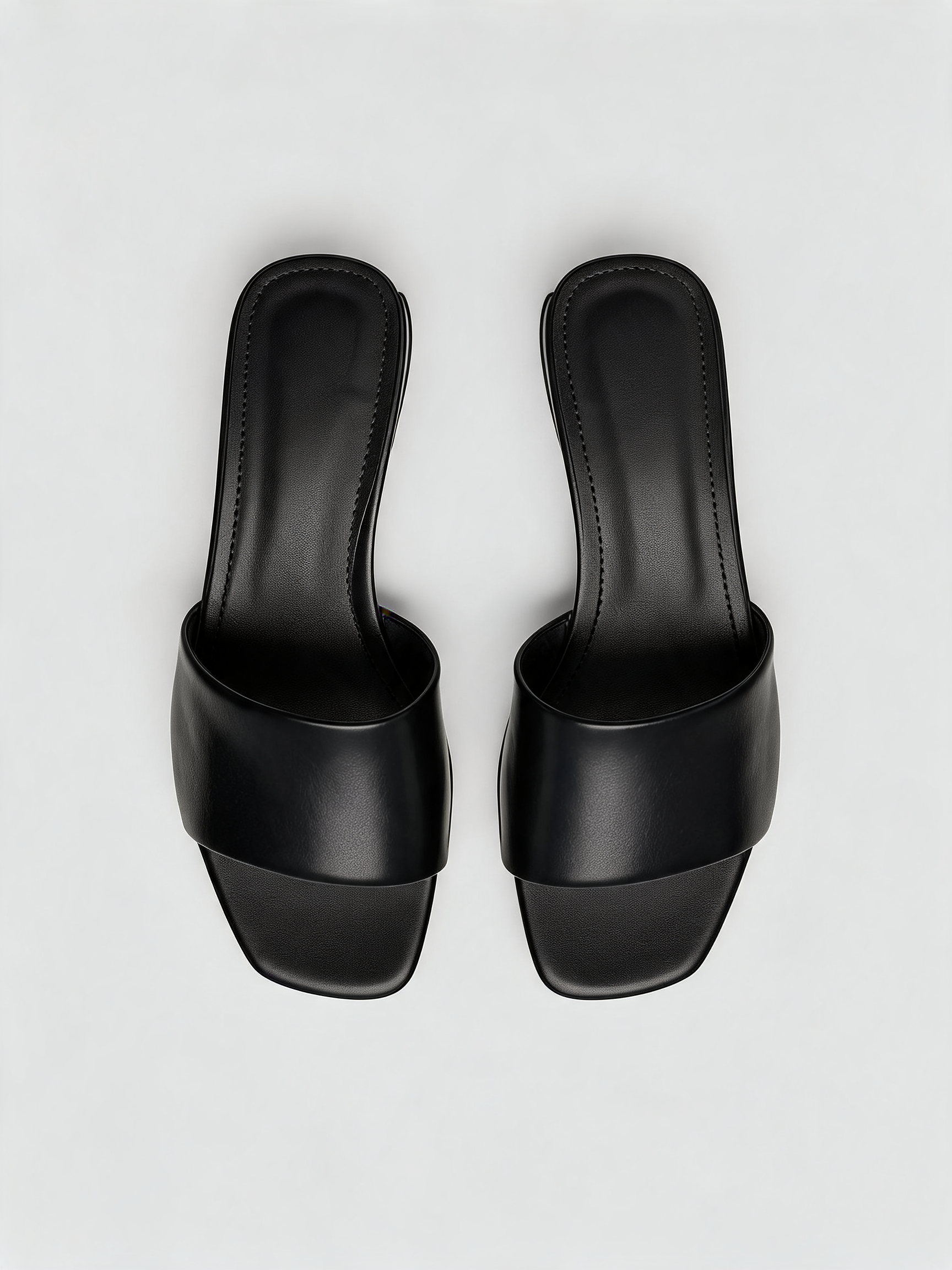 Black leather block heel mules with square open toe — Belvarnè Noir pair