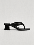 Black leather thong heel mule square toe sculptural block heel padded strap women's