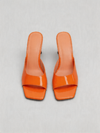Patent curved heel mule square open toe tangerine orange top view women's
Patent curved heel mule square open toe tangerine orange side view women's
Patent curved heel mule square open toe tangerine orange heel detail women's