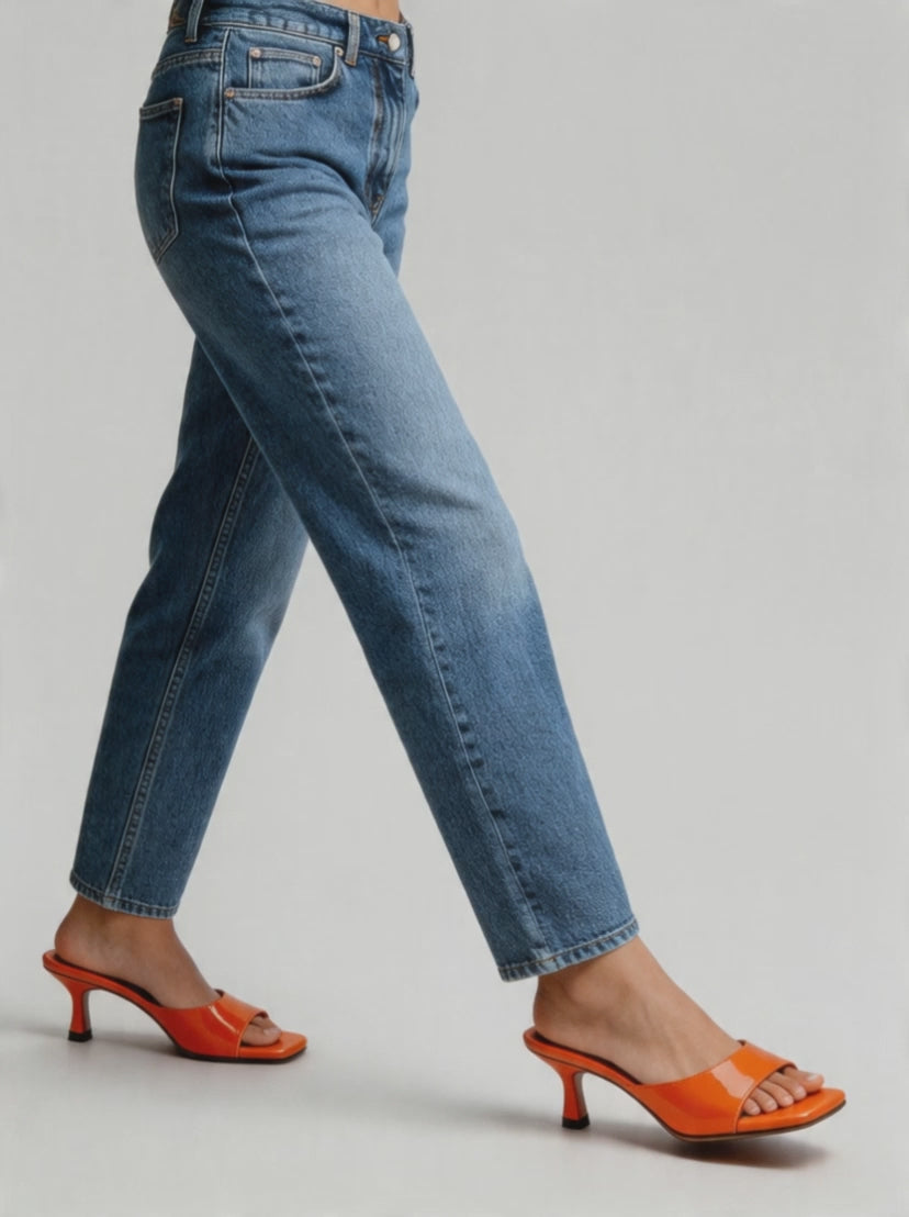 Patent curved heel mule square open toe tangerine orange top view women's
Patent curved heel mule square open toe tangerine orange side view women's
Patent curved heel mule square open toe tangerine orange heel detail women's